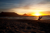 Surfer at sunset, Cape Town