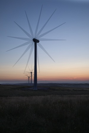 Wind turbine during sunset